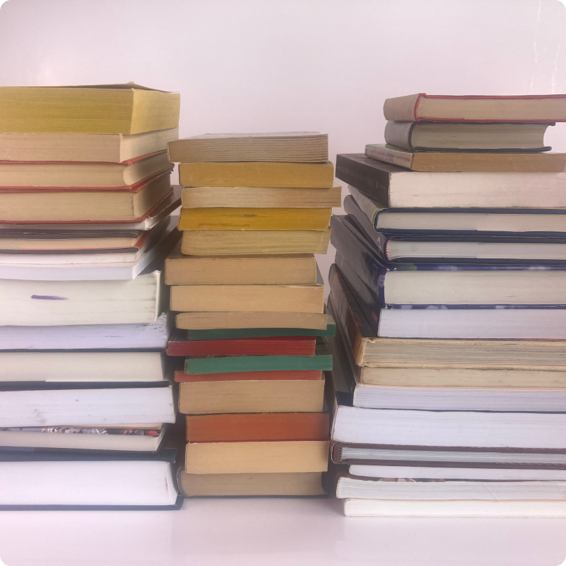 Stacks of used books waiting to be evaluated
